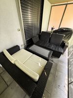 Rattan Lounge mit Polster und Tisch