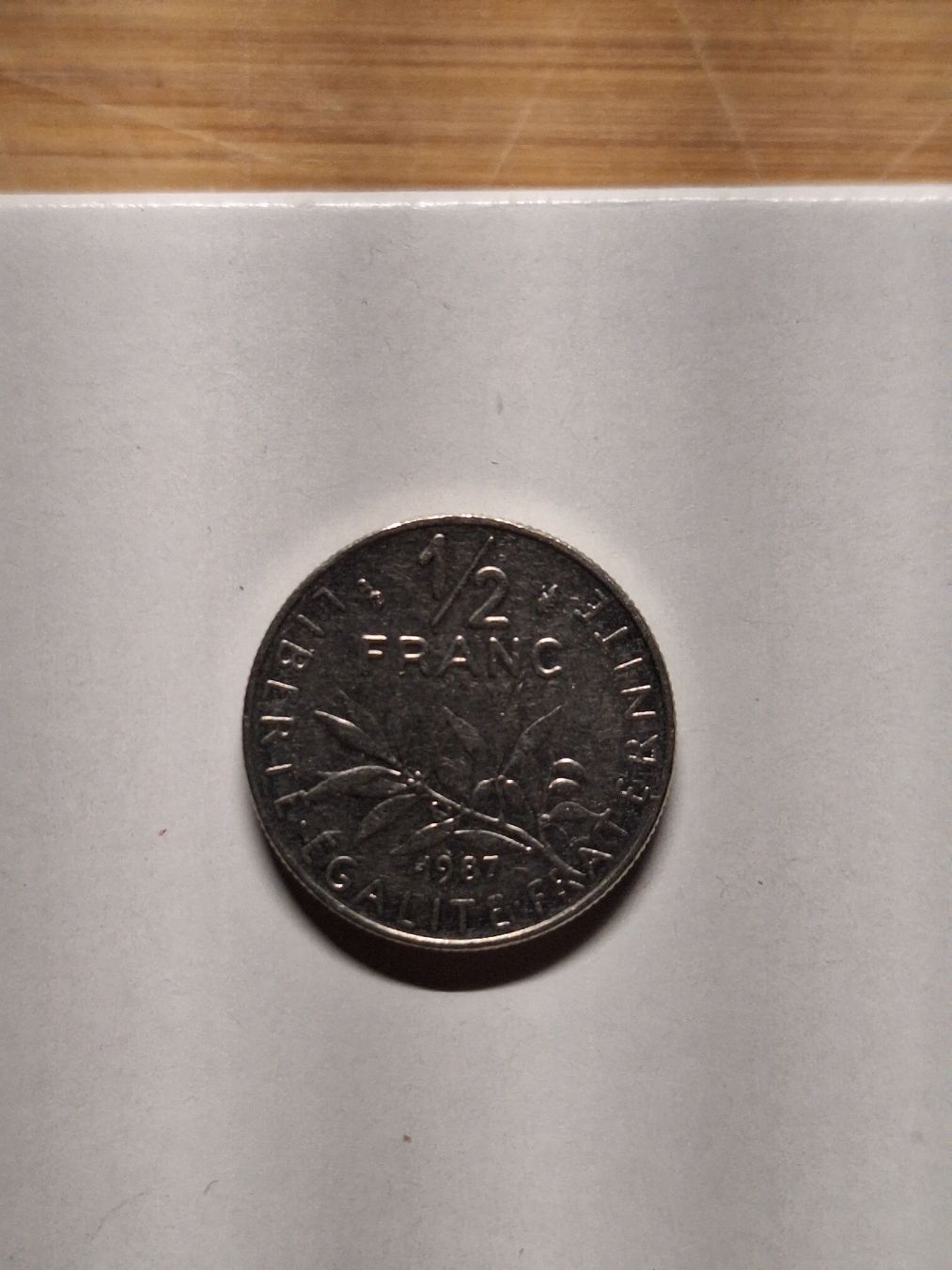 Alle Münzen: 1/2 franc francaise 1987  – Gebraucht aus Riva San Vitale von P.butti