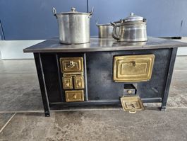 Cuisinière miniature ancienne Märklin avec casseroles