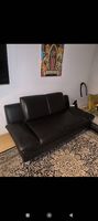 Schönes schwarzes Ledersofa in sehr gutem Zustand