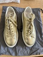 Paire de baskets femme Hogan cuir doré, taille 36.