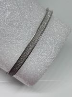 Bracciale rigido argentato con glitter brillantinato 7-8 cm