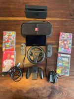 Nintendo Switch + Slim Case und 4 Spiele