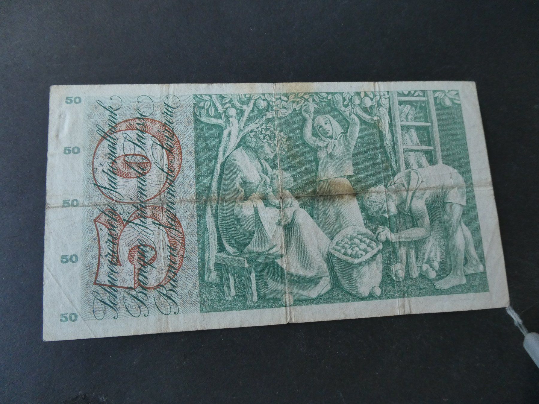Banknoten: Schweiz 1955,  50 Franken – Gebraucht aus Hinterforst von Rohusri 1