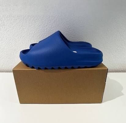 Adidas Scarpe da uomo: Yeezy Slides Azure – Nuovo e nell'imballaggio originale da Zürich venduto da med_rxy9