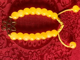 Bracelet perles jade jaune avec pendentif en or 750