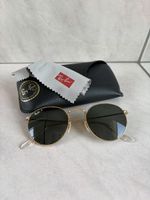 Ray-Ban RB3447 Round Metal 001/58 Polarized Gold sunglasses