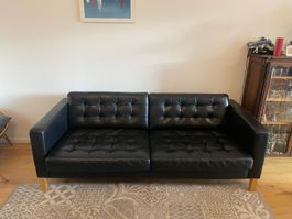 Canapé noir en cuir