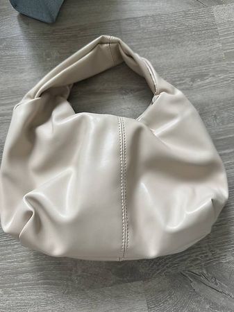Creme Handtasche