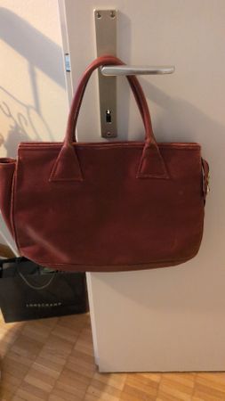 Schöne Longchamp Handtasche aus Leder in Weinrot – Gebraucht