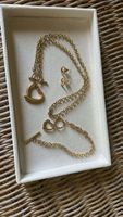 Ensemble de bijoux dorés - collier, bracelet, boucles 49