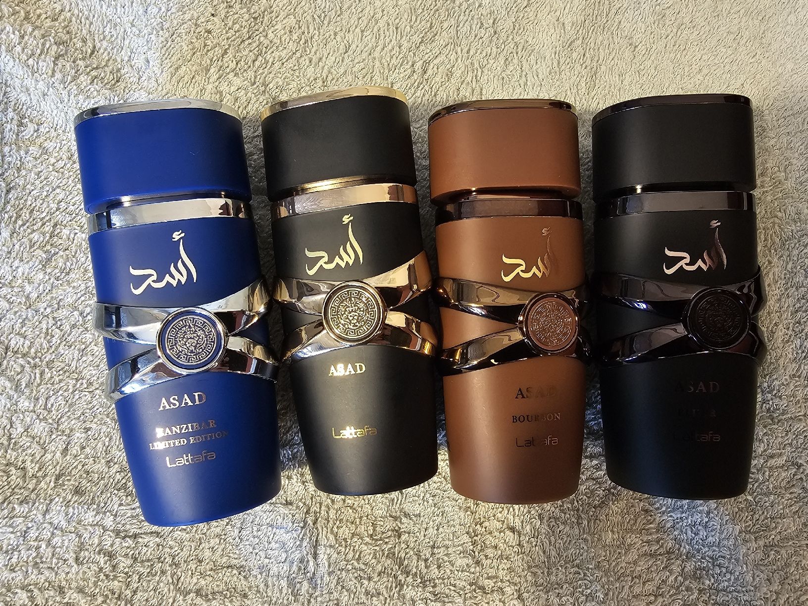 Lattafa Parfum & Eau de Toilette: Lattafa Asad Kollektion 4x25 ml – Gebraucht aus Gurmels von Bluebaer25