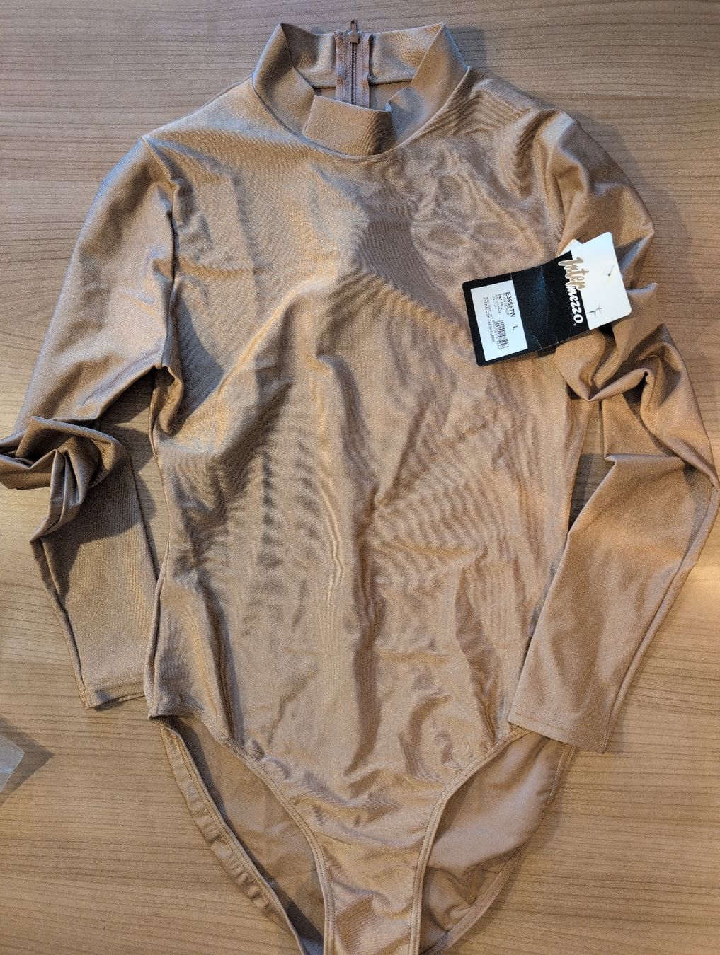 Lots de vêtements: Eislaufbody – Neuf avec emballage d'origine à Frauenfeld par syre01