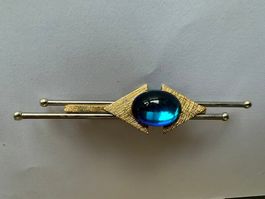 Brosche mit blauem Stein goldfarben gebraucht guter Zustand