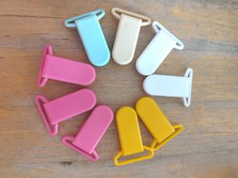 9 Clips Neu Plastik 5 Farben, Nuggi