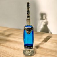 Flacon à parfum ancien en verre bleu et métal argenté