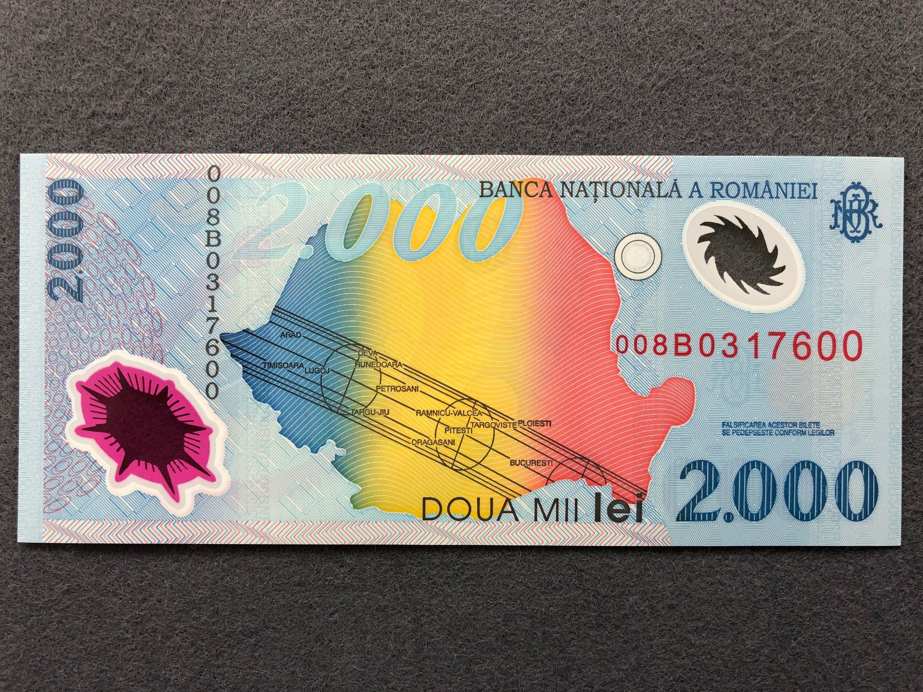 Banconote: Romania 1999 - Rumänien - 2000 Lei UNC – Nuovo e nell'imballaggio originale da Pfäffikon SZ venduto da Sieben77