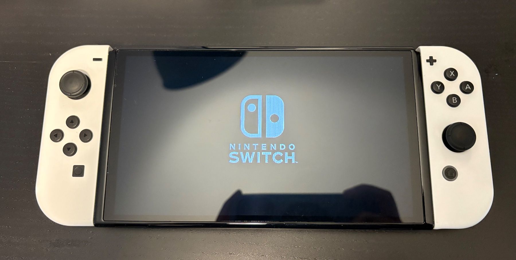 Nintendo Console: Nintendo Switch OLED + Satisfye SwitchGrip Pro mit Hülle – Usato da Schaffhausen venduto da vmeb 2