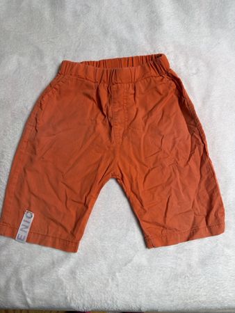 Kinder Shorts orange mit Gummizug gebrauchter Zustand