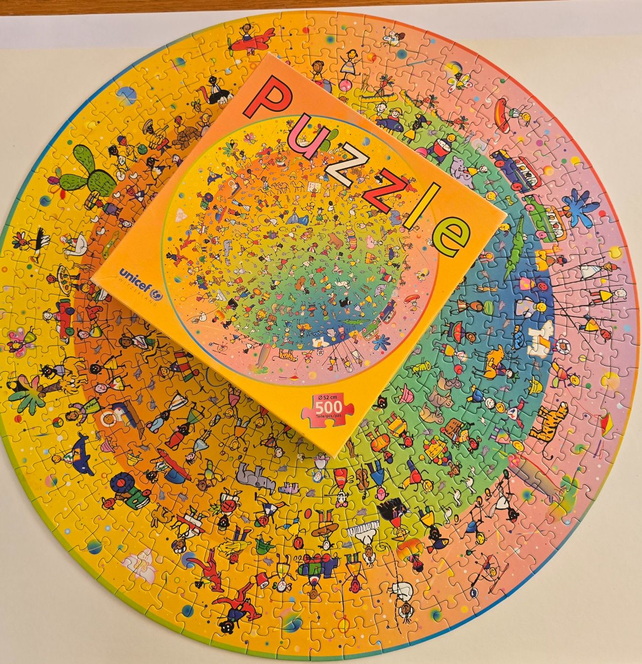 Puzzle: Puzzle rund 500  UNICEF  2003 – Usato da Rheinau venduto da MakalekaAloha 4