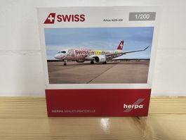 Swiss Airbus A220-300 Herpa 1:200 Metallmodell "Vignerons"