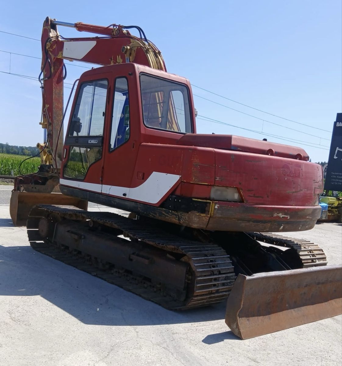 Kobelco Bagger: Bagger Kobelco 13 Tonnen mit Schild – Gebraucht aus Niederbipp von baggerch 1