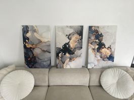 Dreiteiliges Leinwandbild-Set mit Marmor Optik in Gold