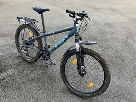 Stoke Kindervelo 24 Zoll mit Federgabel, grau
