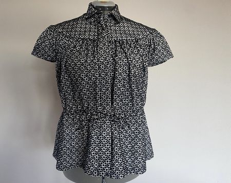 Alaïa Bluse/ Jäckchen Gr. 40/42 schwarz/weiss gepunktet