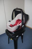 MaxiCosi Kindersitz mit Sicherung am Autositz.