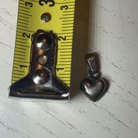 Silver tone heart pendant