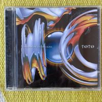 TOTO-THROUGH THE LOOKING GLASS