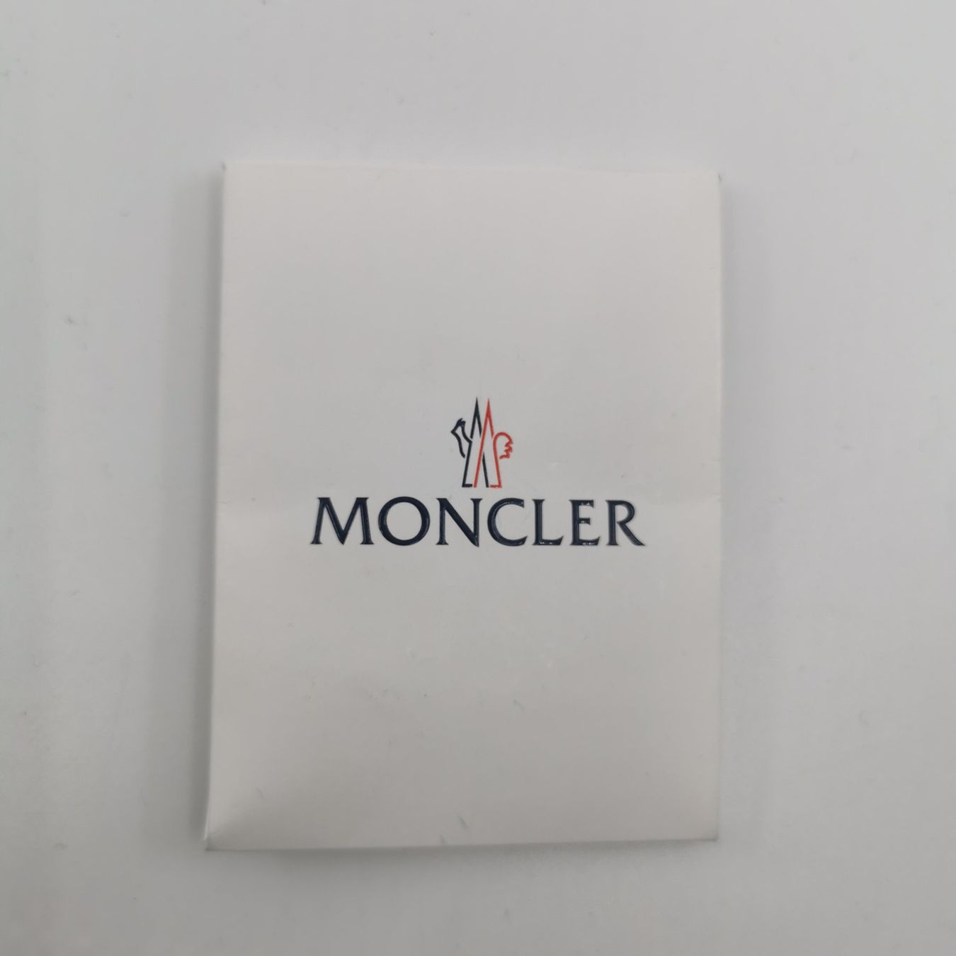 Boutons: Set de boutons original pour doudoune Moncler – Neuf avec emballage d'origine à Lutry par Brocantosaurus