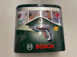 Akkuschrauber Bosch IXO mit Ladestation in Metallbox