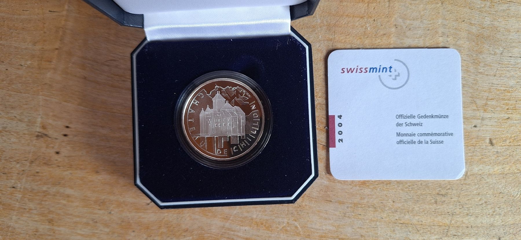 Tutti le monete: Pièce commémorative Suisse 2004, Château de Chillon – Nuovo e nell'imballaggio originale da Le Sentier venduto da Loorenz
