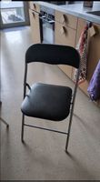 3x schwarzer Klappstuhle