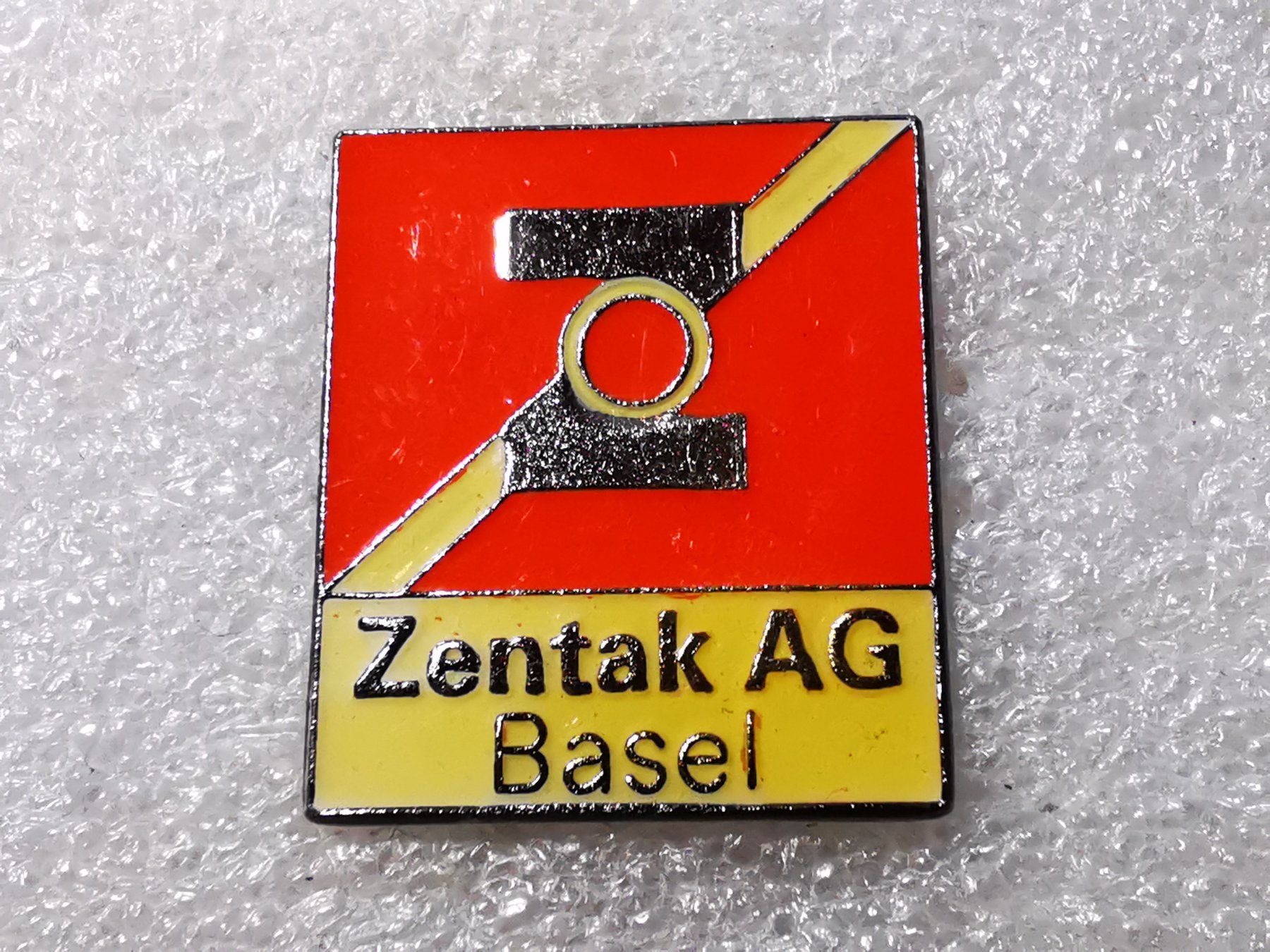 Placchette & Badge: Ansteckpin 64: Zentak AG Basel – Usato da Oppligen venduto da Pin-Fall-Shop