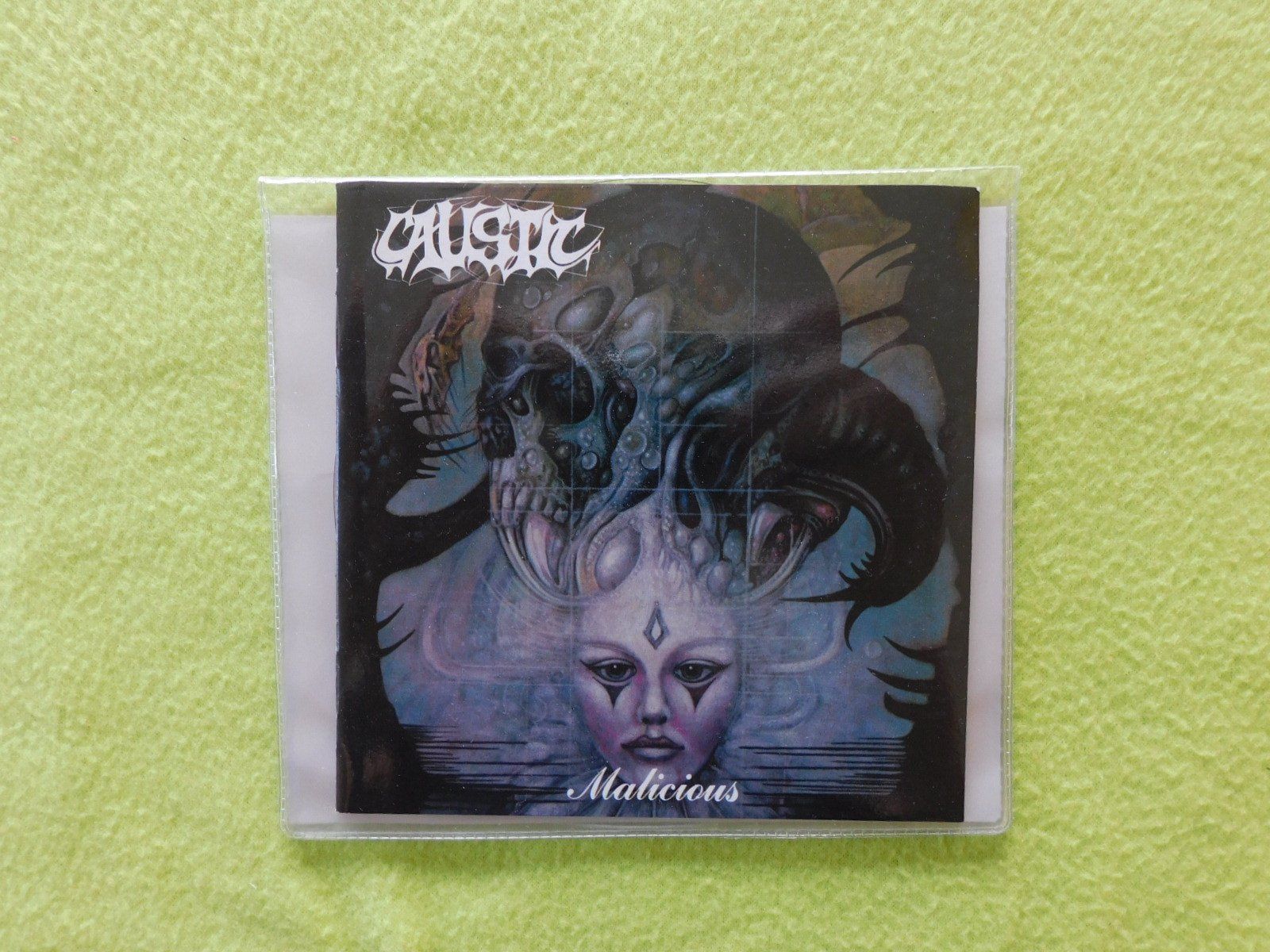 CD: Caustic - Malicious - Ultra rare Swiss CD – Usato da Emmenbrücke venduto da keep-vinyl-alive