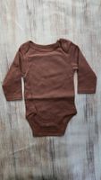 👣 Baby-Body in Schokoladenbraun - 100% Baumwolle