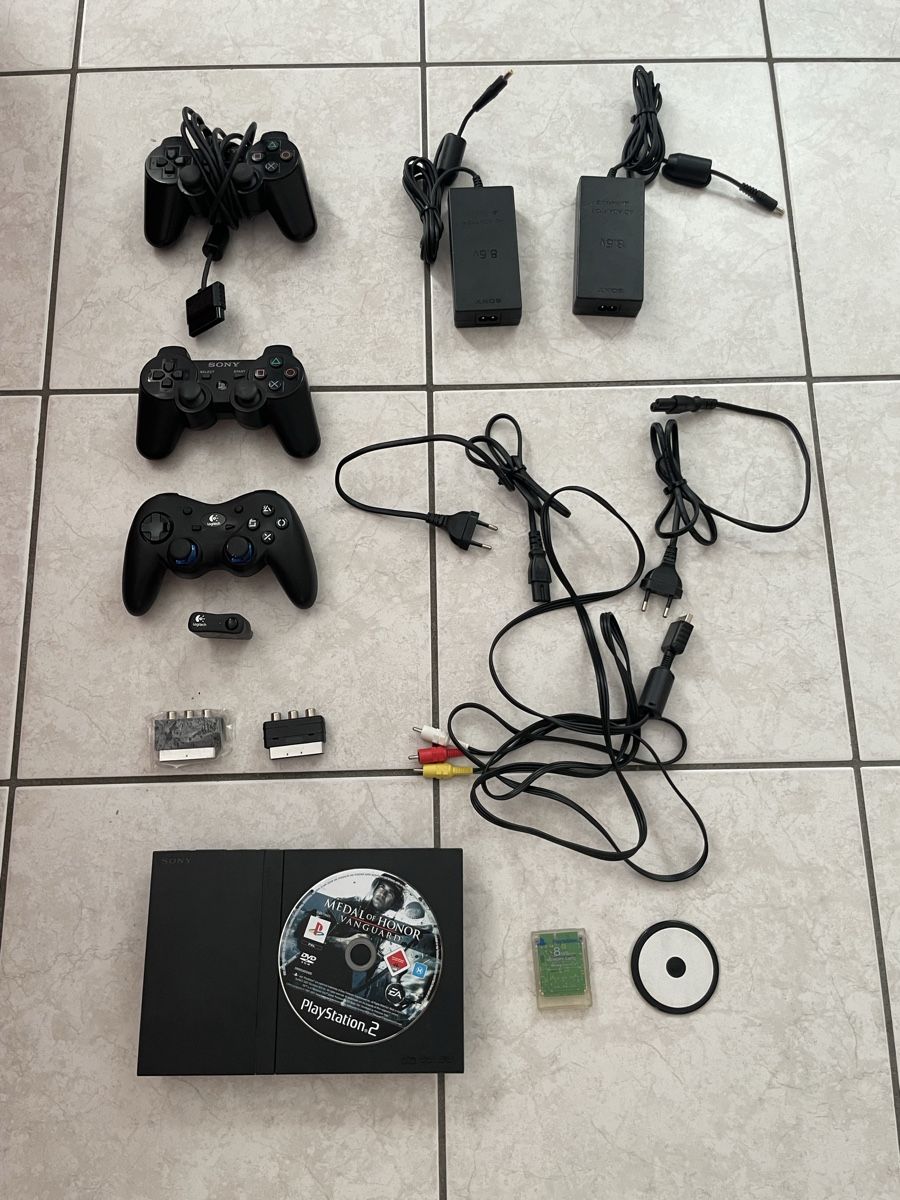 Sony Console: Lotto PS2 Slim + Manopole + Accessori – Usato da Mezzovico venduto da esa_d9tc
