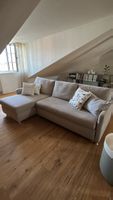 Ecksofa mit Schlaffunktion und Bettkasten beige