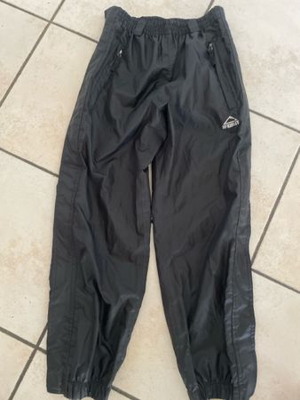 McKinley Regenhose Gr.140 Kinder Schwarz seitl. Reissverschl