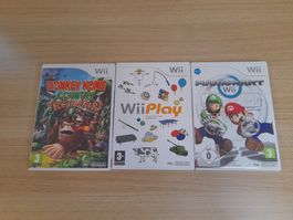 Lot de 3 jeux de Wii (Mario Kart, Donkey Kong, etc.).