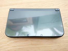 New Nintendo 3DS XL metallic / schwarz mit Stift und Kabel