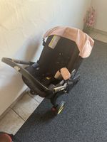 Kinderwagen Doona mit neugeboreneinsatz