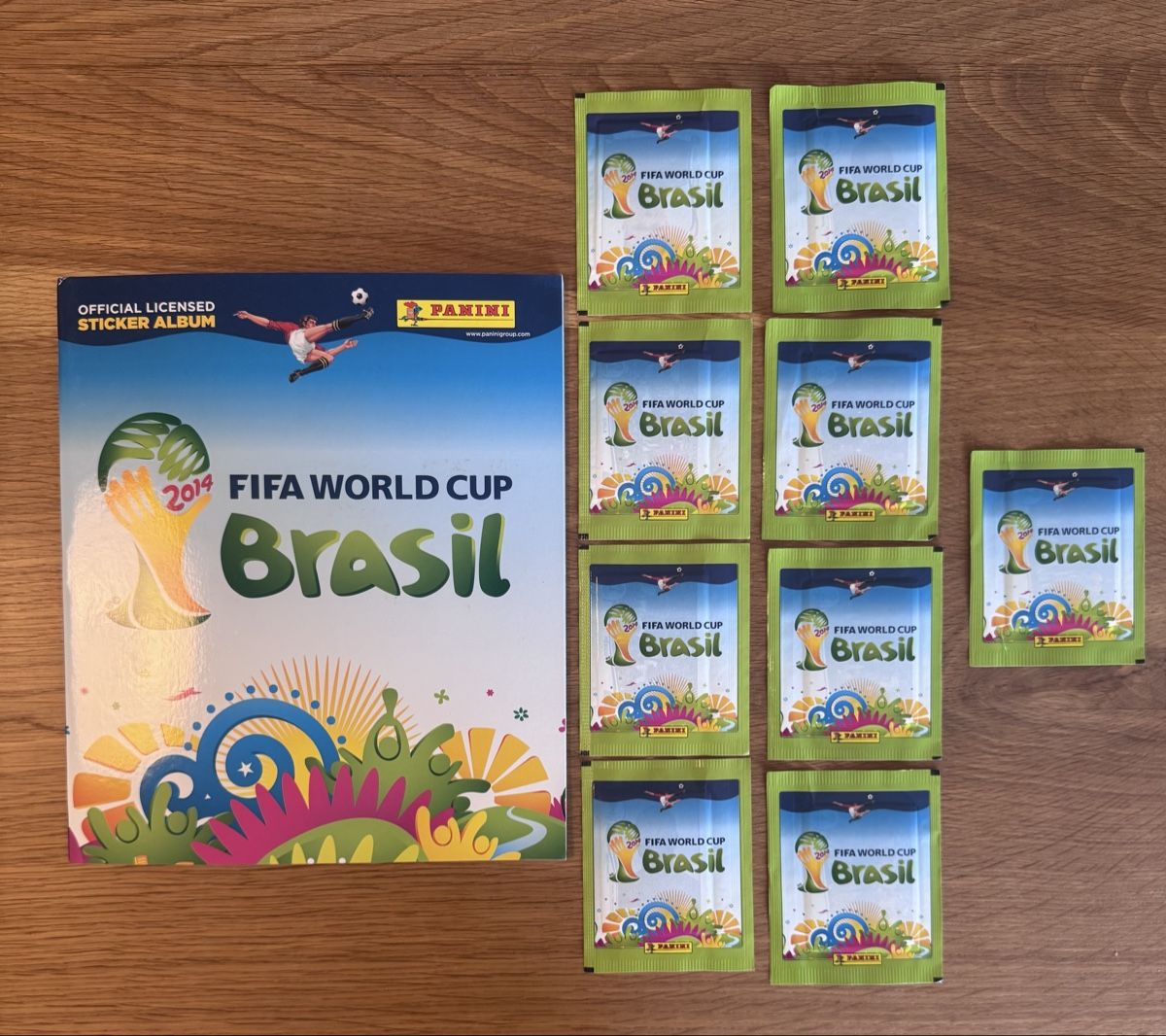 Panini Alben: Panini WM 2014 Album leer + 9 Packs – Neu (gemäss Beschreibung) aus Emmen von Panininho