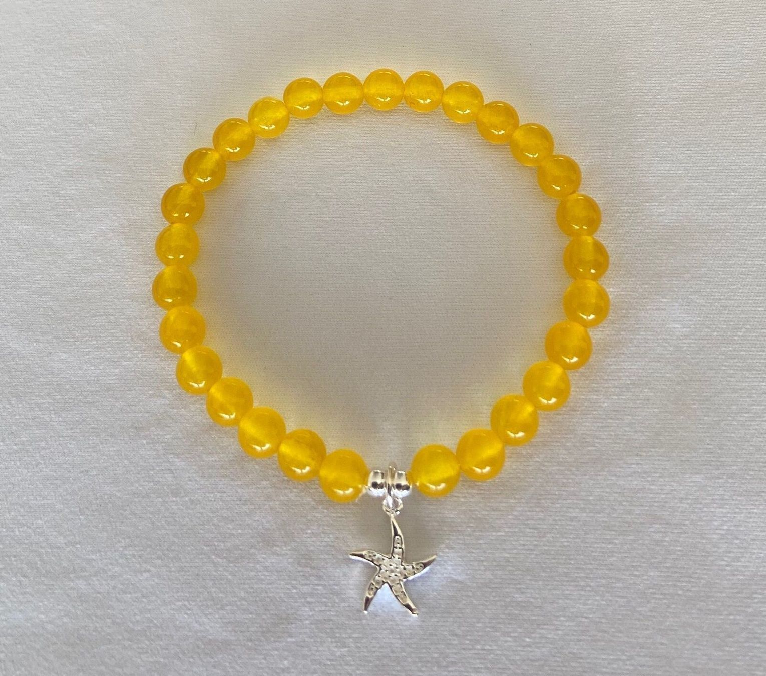 Bracciali & Braccialetti: Edelstein Armband Jade Silber Seestern auf Mass – Nuovo e nell'imballaggio originale da Zuzwil SG venduto da Lemliskat