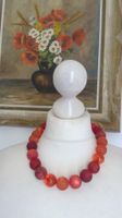 Collier artisanal en perles Polaris tons orange & rouge