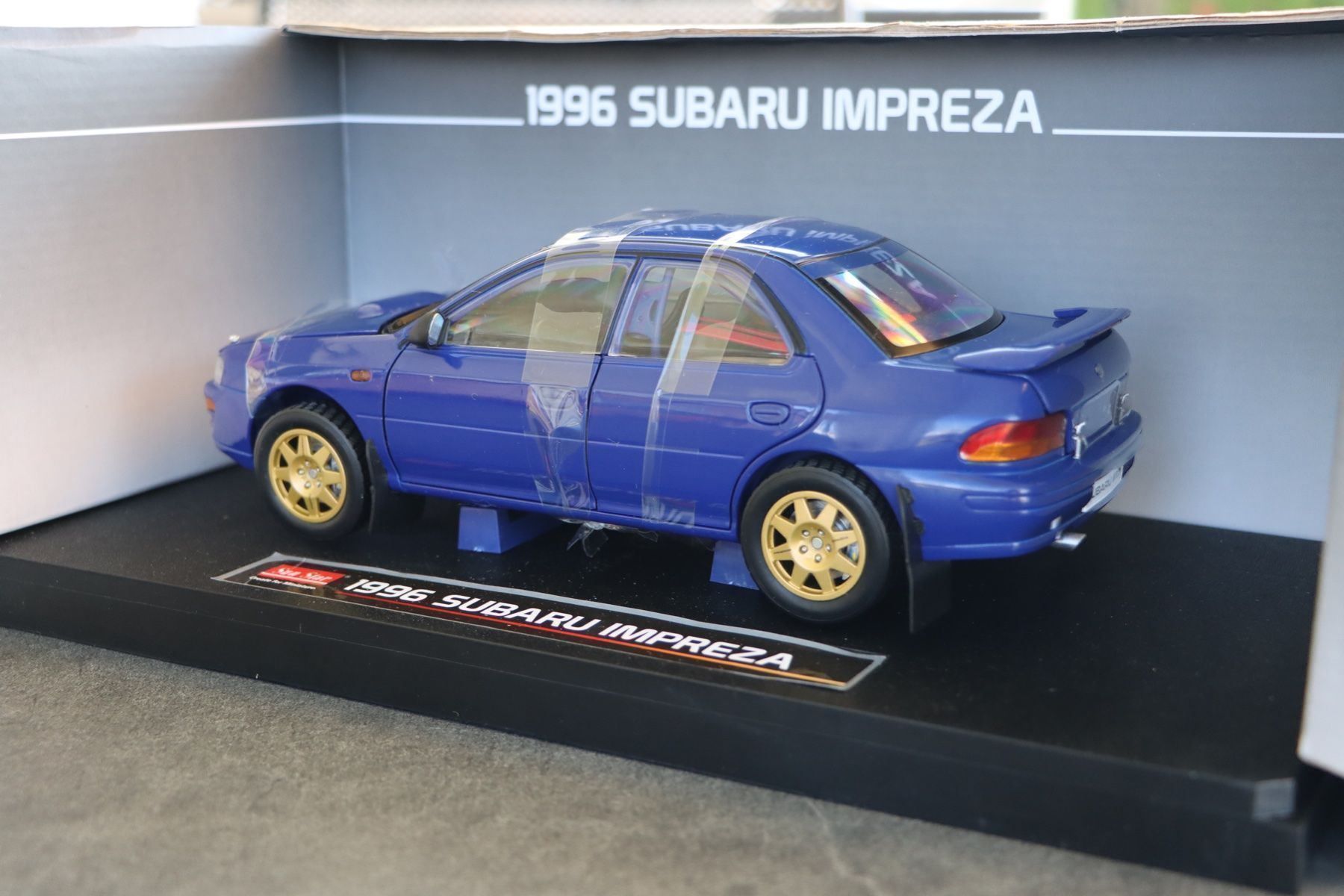 Subaru Modellini d'auto: Subaru Impreza 1996 1:18 SunStar – Nuovo e nell'imballaggio originale da Bühl b.Aarberg venduto da modelldiecast 4