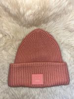 Acne Studios Gerippte Mütze mit Gesicht-Patch rosa